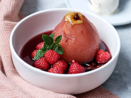 Poached pears with raspberries