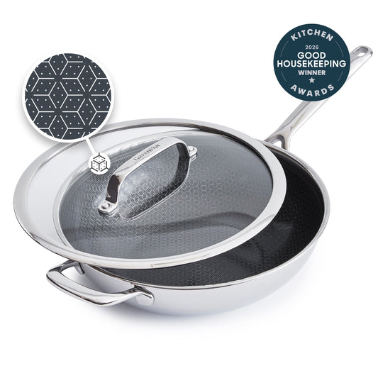 Black 12-inch ceramic nonstick wok with lid, featuring a hexagonal pattern on the cooking surface.