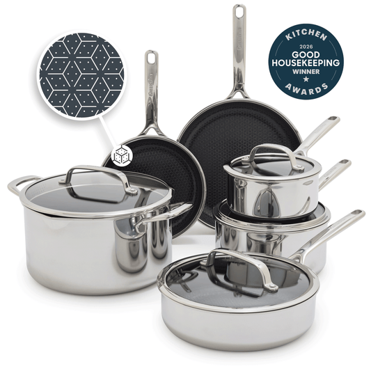 Ten-piece ceramic nonstick cookware set with glass lids, shown in a modern kitchen setting.