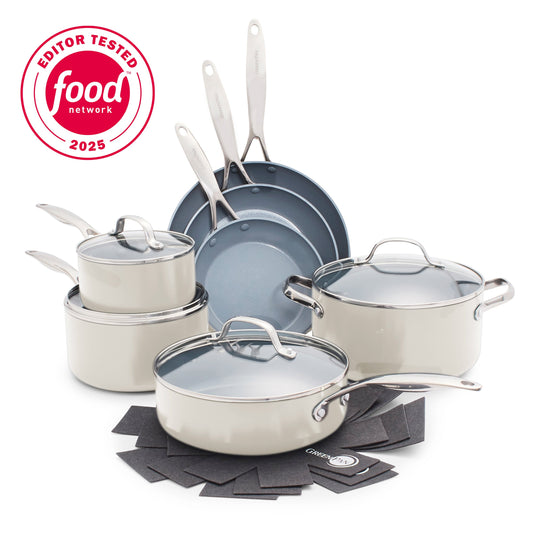 Cream ceramic 11-piece cookware set with glass lids, shown arranged together on a plain surface.